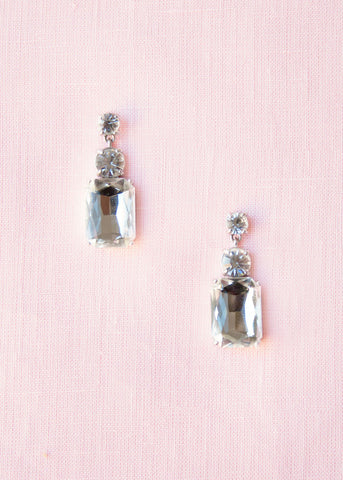 drop earrings with a dramatic square baguette and round crystals