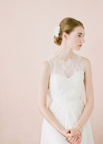 wedding hair idea with lace fabric flower in hair.